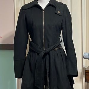 Black jacket lined with zipper and tie front